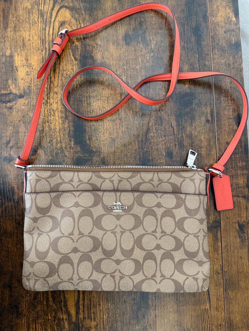 Coach Brown Signature Canvas Crossbody with Red Strap